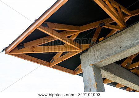 Roof Trusses Covered With A Membrane On A Detached House Under Construction, Visible Roof Elements, 