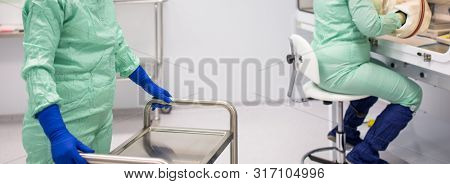 Cytostatic meds being prepared in a super clean lab environment - (shallow DOF; color toned image)