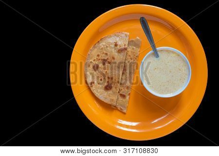 Egg Paratha With Dalia Or Daliya, Cereal Food Know As Bulgur Cooked In Milk Served With Egg Stuffed 