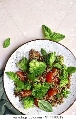 Buckwheat Salad With Vegetables.top View With Copy Space.