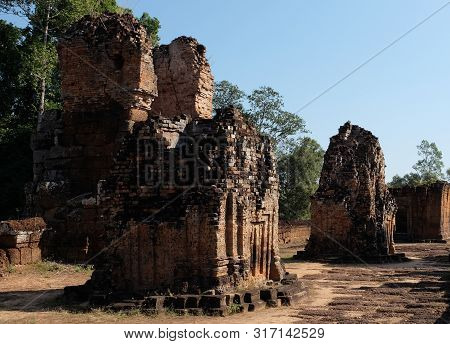 Dilapidated Khmer Baray. Medieval Brick Buildings. Architectural Monument.