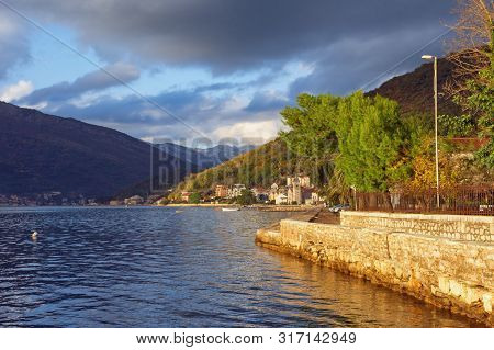 Sunny Autumn Day In Mediterranean Village. Montenegro, Tivat. View Of Bay Of Kotor And Donja Lastva 