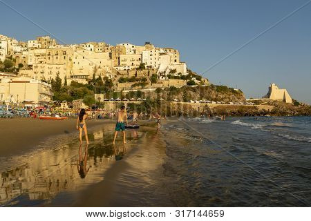 August 12, 2019, Sperlonga, Italy, View On Old Town Sperlonga And Clowded Beach During August Holida