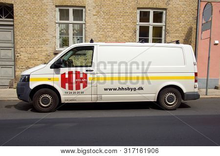 Roskilde, Denmark - July 19, 2019: Hhs Byg Aps Service Van Parked By The Side Of The Road. Nobody In