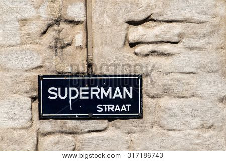 Antwerpen, Belgium - June 23, 2019: Closeup Of White On Blue Street Name Sign Of Suderman Straat Con