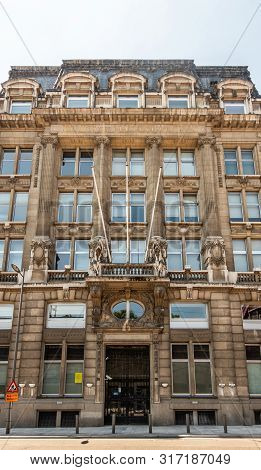 Antwerpen, Belgium - June 23, 2019: Beige-brown Facade Of Monumental Diamond Exchange Building With 