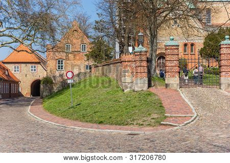 Ratzeburg, Germany - April 19, 2019: Cobbledtoned Street In Front Of The Dom Church In Ratzeburg, Ge