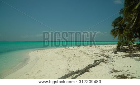 Tropical Sand Beach By Turquoise Water. Onok Island, Balabac, Philippines. Summer And Travel Vacatio