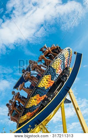 Kouvola, Finland - 10 August 2019: Ride Trombi In Motion On Sky Background In Amusement Park Tykkima