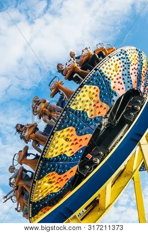 Kouvola, Finland - 10 August 2019: Ride Trombi In Motion On Sky Background In Amusement Park Tykkima