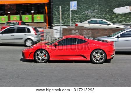 Kiev, Ukraine; October 22, 2014, Ferrari F430 In Motion. Red Supercar