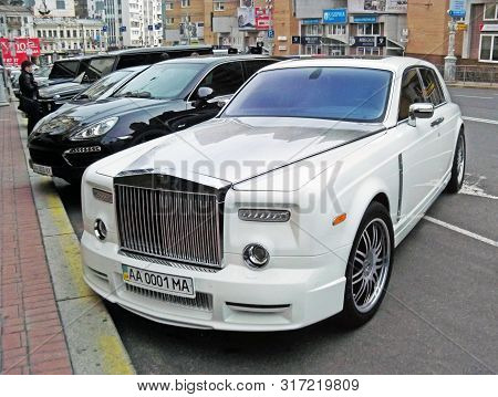 August 25, 2010. Ukraine - Kiev. White Rolls-royce Phantom Mansory Conquistador In The Parking Lot
