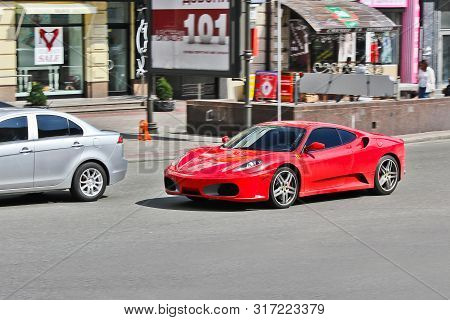 Kiev, Ukraine; October 22, 2014, Ferrari F430 In Motion. Red Supercar