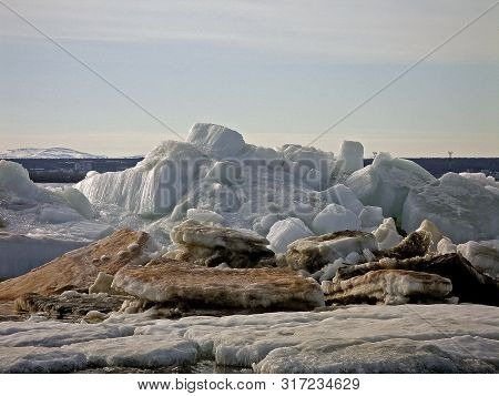 Melting Snow In The Spring. The Spring Heat Will Melt The Snow. Brooks And Streams Of Melt Water