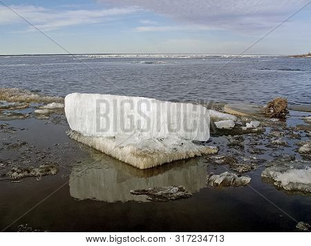 Melting Snow In The Spring. The Spring Heat Will Melt The Snow. Brooks And Streams Of Melt Water