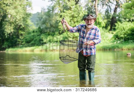 Fisherman Fishing Equipment. Hobby Sport Activity. Pensioner Leisure. Fish Farming Pisciculture Rais