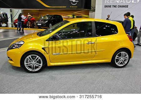 Kiev, Ukraine; April 10, 2014. Yellow Renault Clio Rs In The City