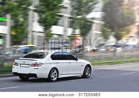 Ukraine, Kiev; March 5, 2014; White Bmw (f10) In Motion
