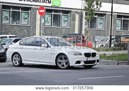 Ukraine, Kiev; March 5, 2014; White Bmw (f10) In Motion