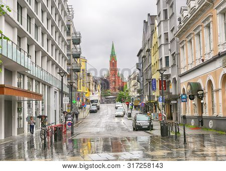 Bergen, Norway 07/18/2019 The Street Torgallmenningen In The Norwegian City Trondheim In The Rainy W
