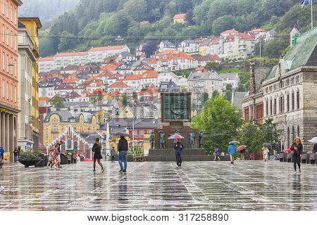 Bergen, Norway 07/18/2019 The Street Torgallmenningen And Sailor`s Monument In The Norwegian City Be
