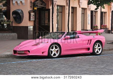Kiev, Ukraine; May 17, 2016. Pink Ferrari Modena F360 Spider Sbarro Gt8