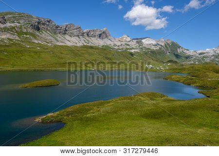 View At Lake Tannensee Over Engelberg In The Swiss Alps