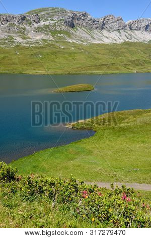 View At Lake Tannensee Over Engelberg In The Swiss Alps