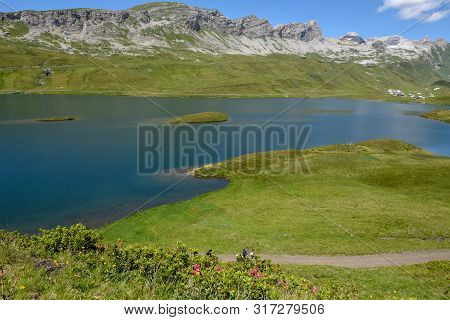 View At Lake Tannensee Over Engelberg In The Swiss Alps