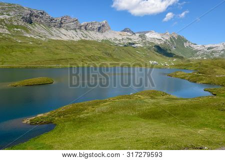 View At Lake Tannensee Over Engelberg In The Swiss Alps