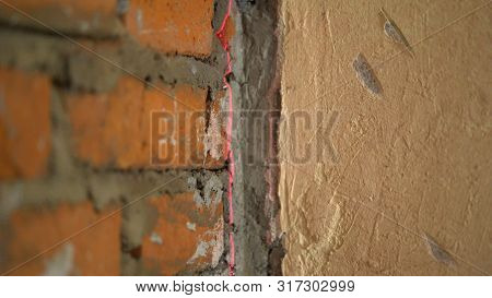 Repair, Expose The Laser Level On The Wall. Level The Walls With A Laser Level. Installation Of New 