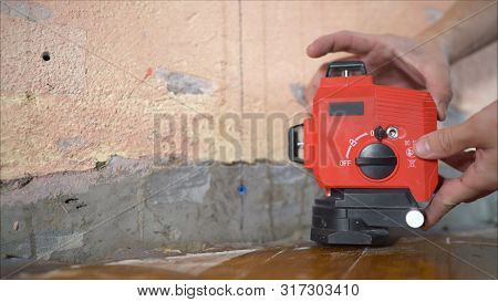 Repair, Expose The Laser Level On The Wall. Level The Walls With A Laser Level. Installation Of New 
