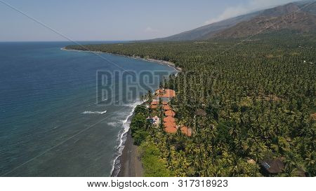 Aerial Seascape Luxury Hotel On Beach Background Mountainss In Tropical Resort. Bali, Indonesia, Tra