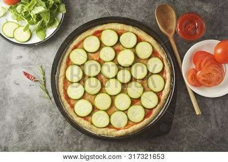 Vegetarian Pizza. Cooking Process Of Vegetable Homemade Pizza With Fresh Ingredients Isolated On Dar