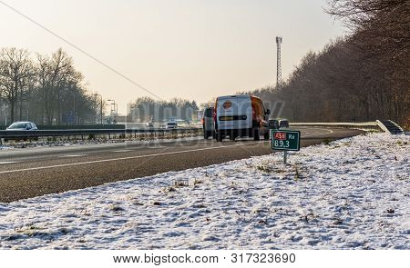 The A58 Highway In Winter Season With Cars Passing By, Roosendaal, The Netherlands, 23 January, 2019