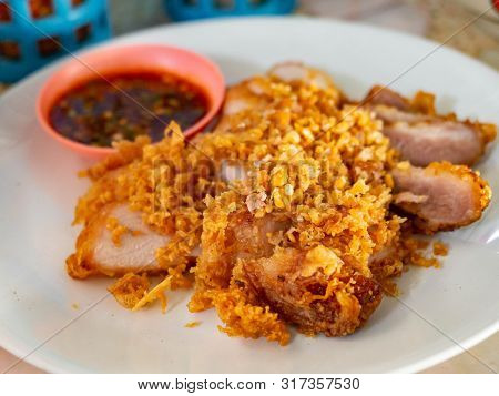 Garlic Fried Pork,good Tasty Food,in Restaurant At Market (sampeng),bangkok,thailand,food Thai