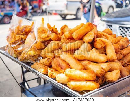 Spring Rolls With Vermicelli,in The Market (sampeng),street Food Thailand,sun Shining