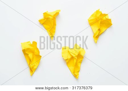 Self Actualization Failure. Four Yellow Crushed Paper Airplanes Isolated On White Background. Copy S