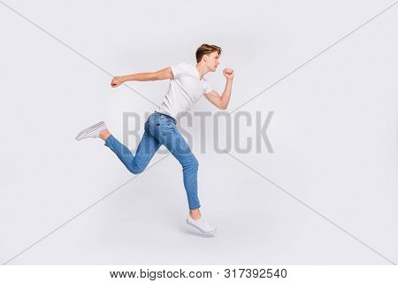 Full Length Photo Of Jumping High Guy Ready Steady Go Concept Wear Casual Outfit Isolated White Back