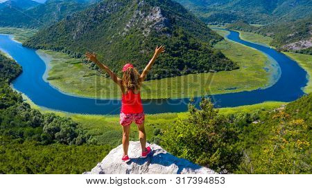 panormic view of landscape of lake skadar in Montenegro, woman happy or holiday concept