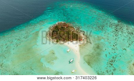 Aerial Seascape Tropical Island And Sand Beach, Turquoise Water And Coral Reef. Malacory Island, Phi