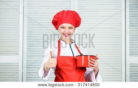 Woman Chef Hold Whisk And Pot. Girl In Apron Whipping Eggs Or Cream. Start Slowly Whisking Or Beatin