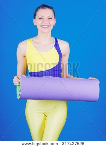 Warming Up Before Training. Sporty Woman Warming Up In Gym. Happy Woman Warming Up With Fitness Mat.