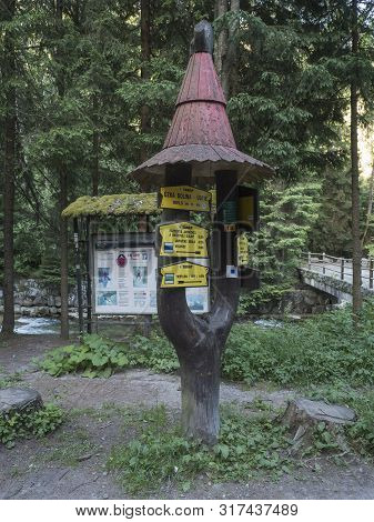 Slovakia, Western Tatra Mountain, July 3, 2019: Wooden Trail Signpost At At Beginning Of Uzka Dolina