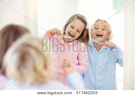 Child Brushing Teeth. Kids With Toothpaste, Brush.