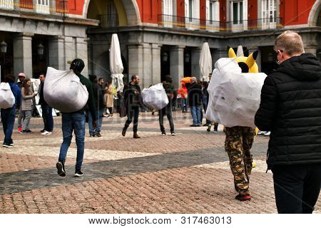 Madrid, Spain- March 7, 2019: Black Illegal Street Vendors Fleeing From The Police In La Plaza Mayor