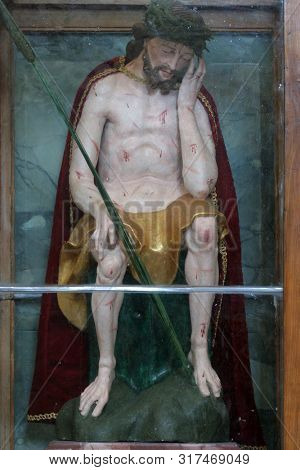 KLOSTAR IVANIC, CROATIA - SEPTEMBER 25, 2011: Wounded Jesus, statue on the altar of the Holy Cross in the Church of the Assumption of the Virgin Mary in Klostar Ivanic, Croatia