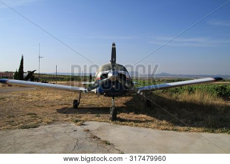 Ontur, Murcia, Spain- June 22, 2019: White And Blue Aircraft Parked In Aerodrome In A Sunny Day Of S