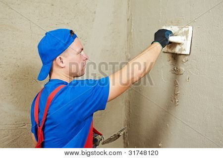 Stuccatore a decorazione ristrutturazione interna parete con galleggiante