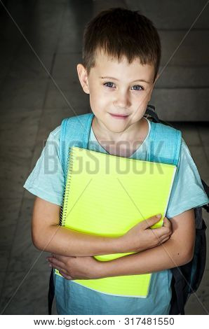 Cute First Grader Kid Start Going To School For The First Time. First Class Elementary School Caucas